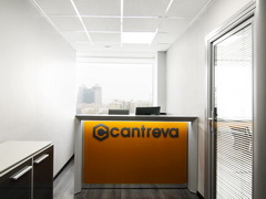 Оранжевая стойка-ресепшн для офиса «Кантрева» 
